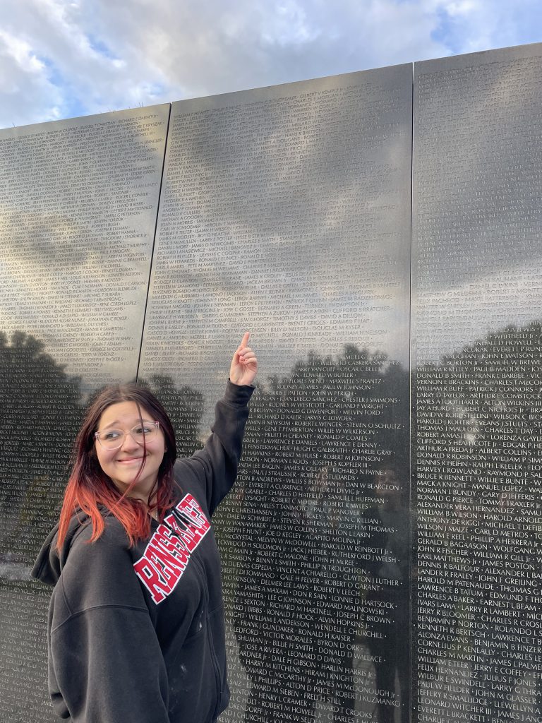 A student at the Vietnam memorial