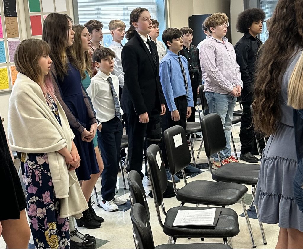 Students attend a music festival and participate in a classroom